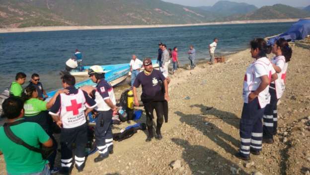 Suspenden búsqueda de personas desaparecidas en la presa Infiernillo, en Michoacán  - Foto 0 